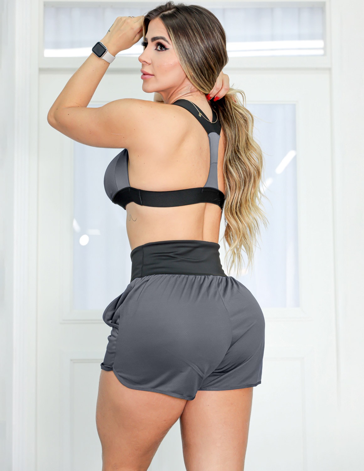 Conjunto Feminino em Dry Fit para Academia com Short e Top com Bojo