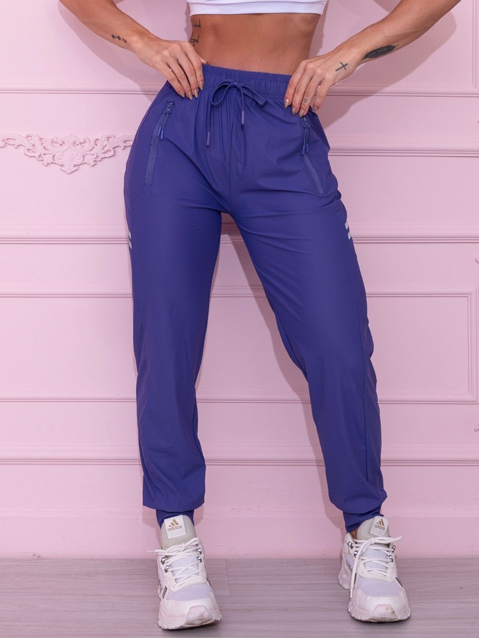 Calça Jogger Fitness Roxo com Detalhe Refletivo